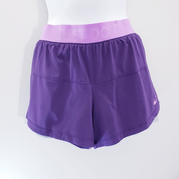 Nike Pants - Nike Running Nylon  Shorts IN   Purple